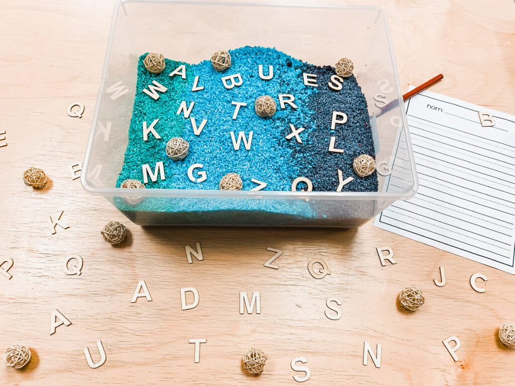 French letter sensory bin activity.