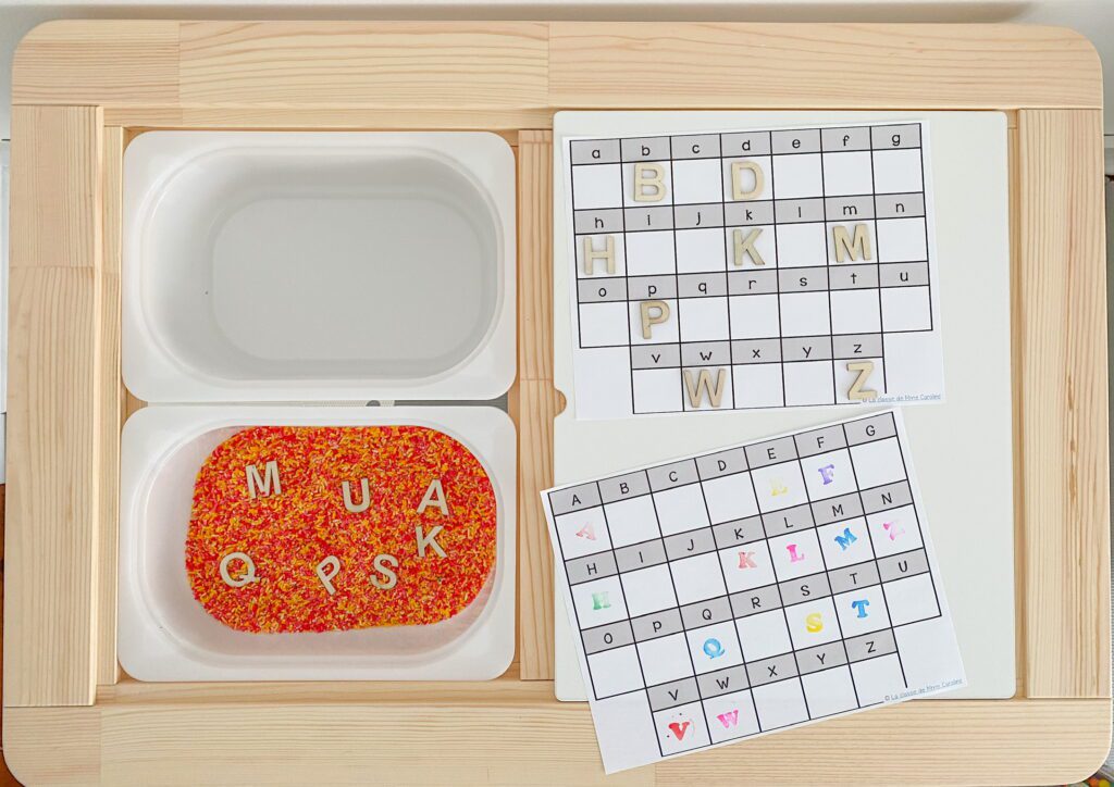 Alphabet sensory bin. Students must find the letter and stamp it.