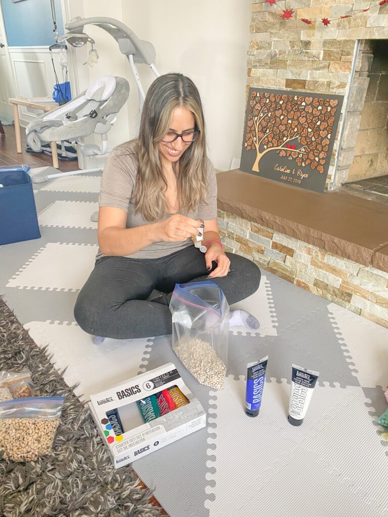 dyeing sensory filler using paint and hand sanitizer. In this step, you need to add the sanitizer and the paint.