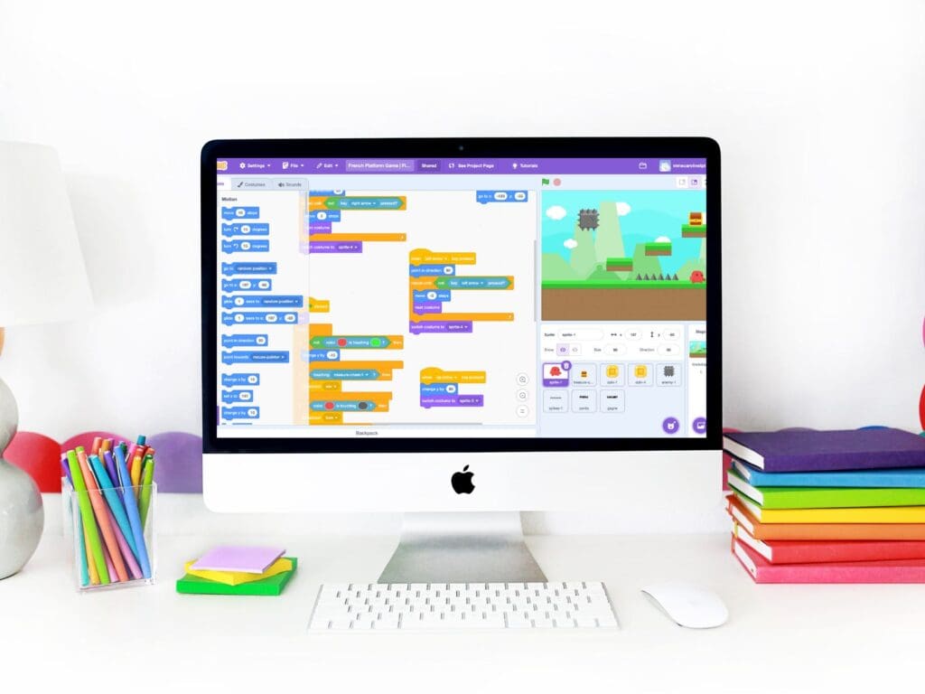 Scratch coding blocks on the computer screen to build a game